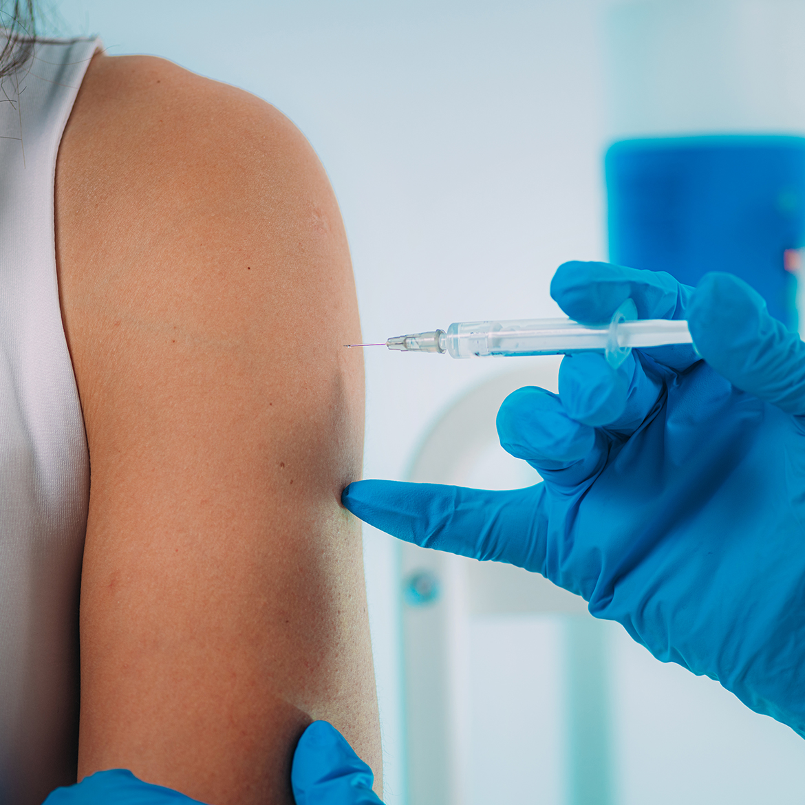 Woman getting COVID vaccine in arm