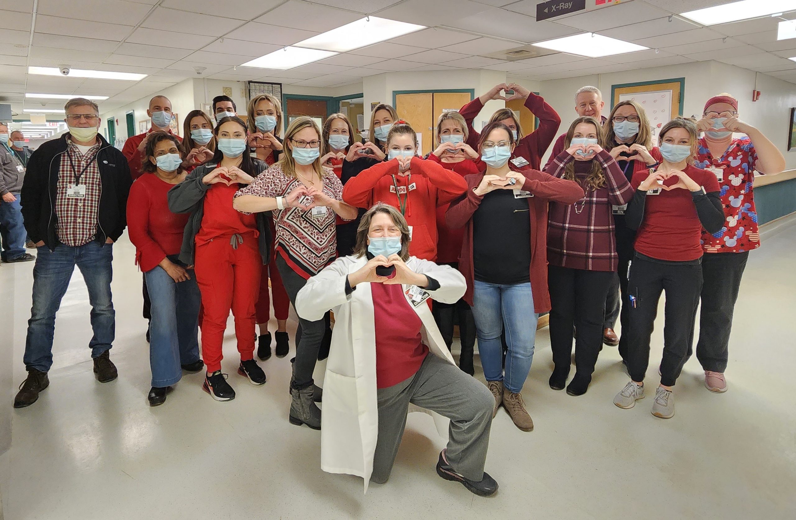 Medical providers posing in red