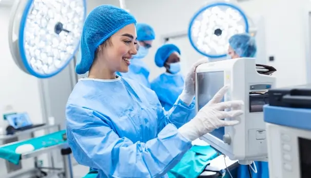 medical provider using equipment in operating room