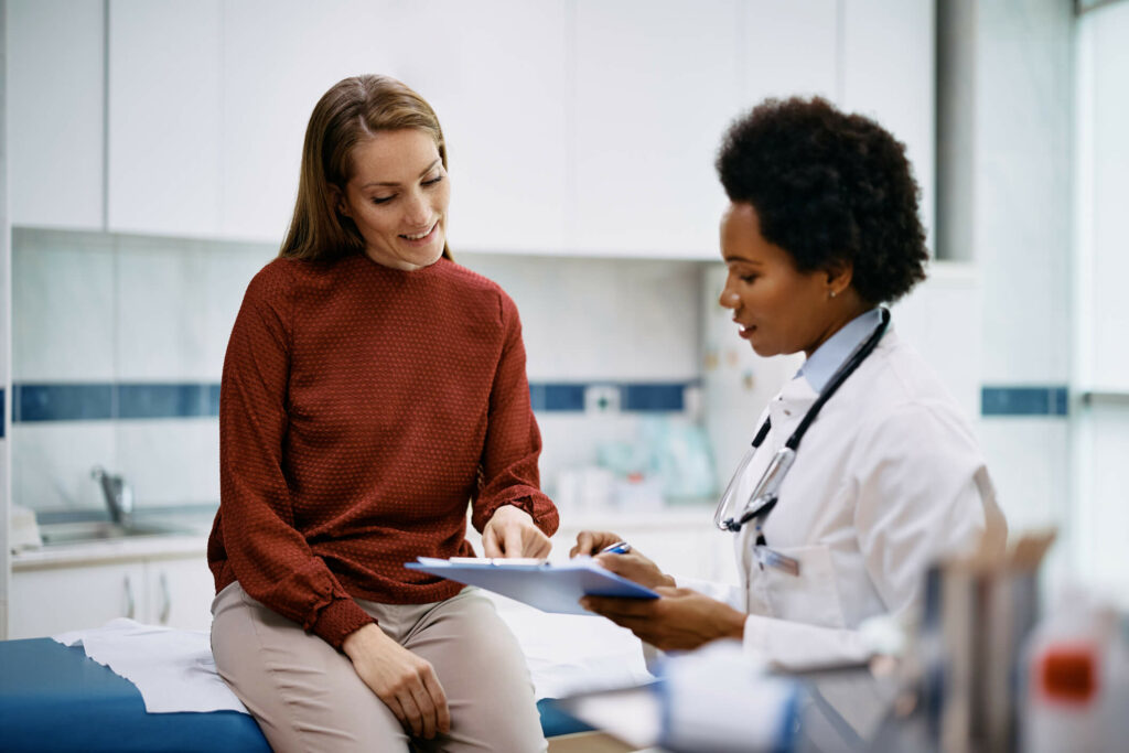 doctor and patient looking at a chart