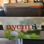 NYCM Insurance beverage cart sign