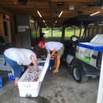 People getting cold drinks ready