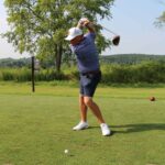 Golfer driving a shot