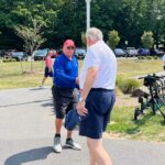 Men shaking hands at golf course