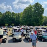 Rows of golf carts getting ready for a tournament