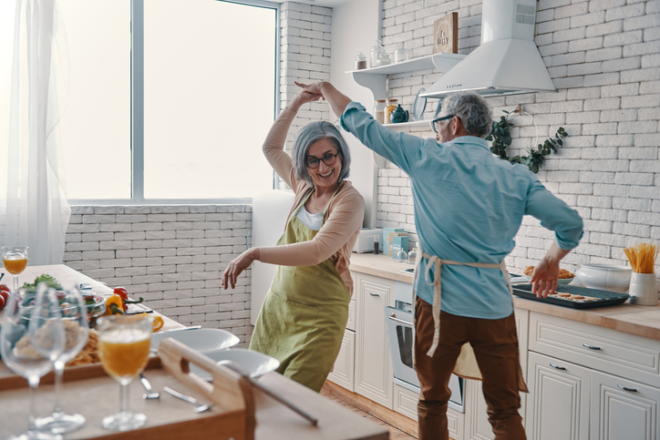 people dancing in kitchen