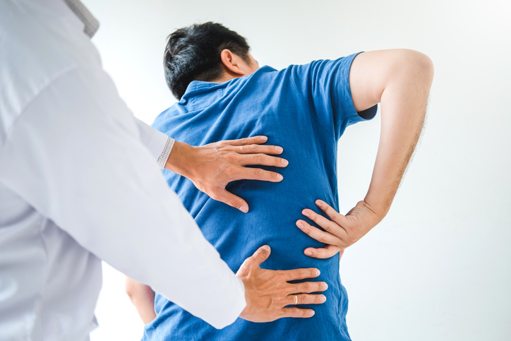 Physical Doctor consulting with patient About muscule pain problems Physical therapy diagnosing concept