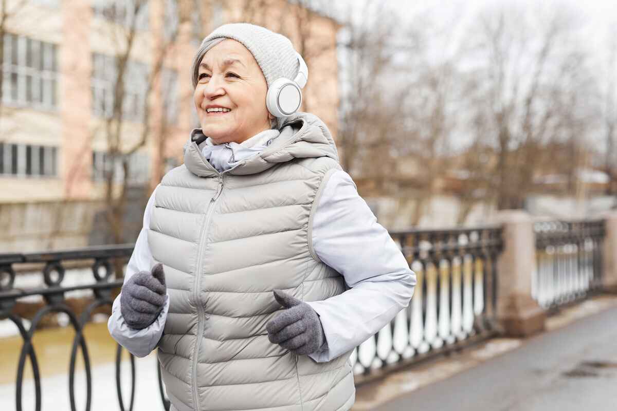 older Woman Running in winter gear